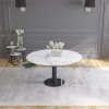 Grande table ronde en céramique marbre mat